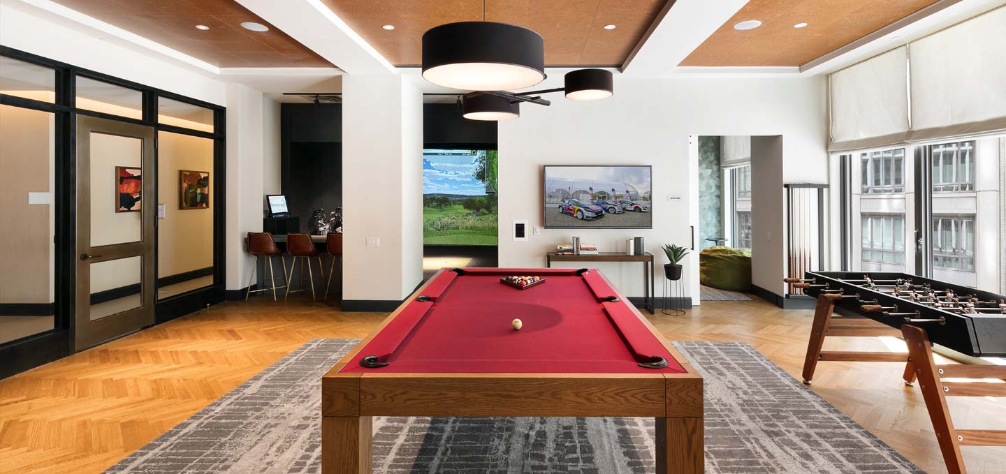 gaming room including foosball, billiard table, and virtual golf